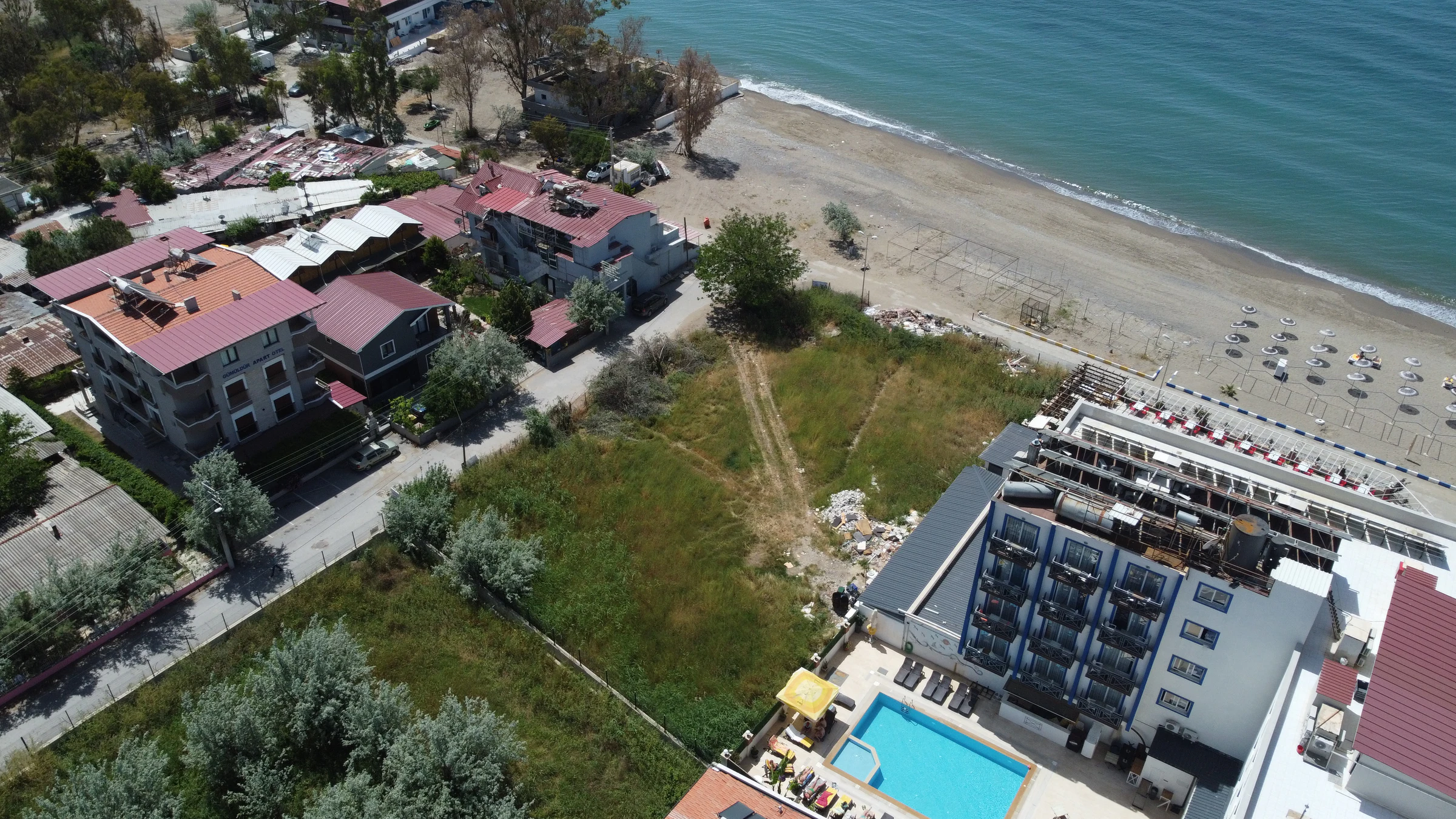 REMAX-TEOK GÜMÜLDÜR'DE TURİZM İMARLI DENİZE SIFIR SATILIK ARSA